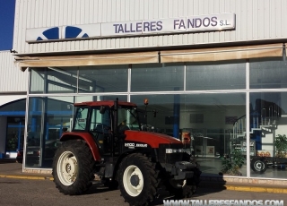 Tractor agrícola New holland M-100, doble tracción, cambio mecánico, 4.341 horas, ruedas delanteras nuevas.