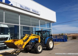 Agricultural tractor brand New Holland TL90, 90hp, 4x4, 7.056 hours, with shovel brand Tenias.