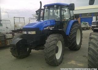 Tractor New Holland TM130 doble tracción, con 7411 horas, del año 2003.