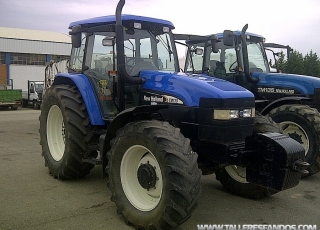 Tractor New Holland TM130 doble tracción, con 7411 horas, del año 2003.