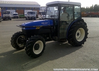 Tractor frutero New Holland, modelo TN 95FA 4WD, doble tracción, con cabina, 1350 horas del año 2006.