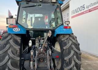 New Holland 8360DT, cambio 18x6 powershift, con defectos de chapa y pintura, 4 distribudores traseros mecanicos, enganche de petaca, cabina climatizada, inversor hidraulico.