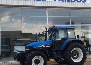 Tractor OCASION marca N.H. modelo TM-155 DT, con eje delantero SuperSteer, Cambio power shift, 4 distribuidores, inversor hidráulico, etc